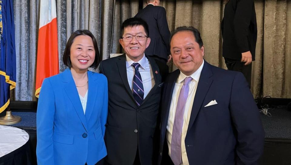 Yiatin Chu (left), founder of The Asian Wave Alliance and a candidate for Senate in northeast Queens posed alongside with Steve Chan (center) and Phillip Wang. Courtesy Steve Chan