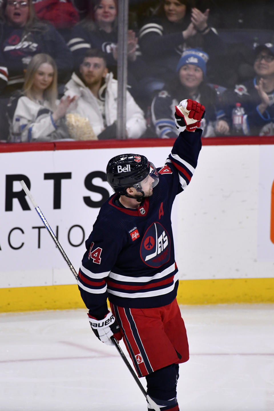 Winnipeg Jets' Josh Morrissey (44) celebrates after his goal against the St. Louis Blues during third-period NHL hockey game action in Winnipeg, Manitoba, Monday, Jan. 30, 2023. (Fred Greenslade/The Canadian Press via AP)