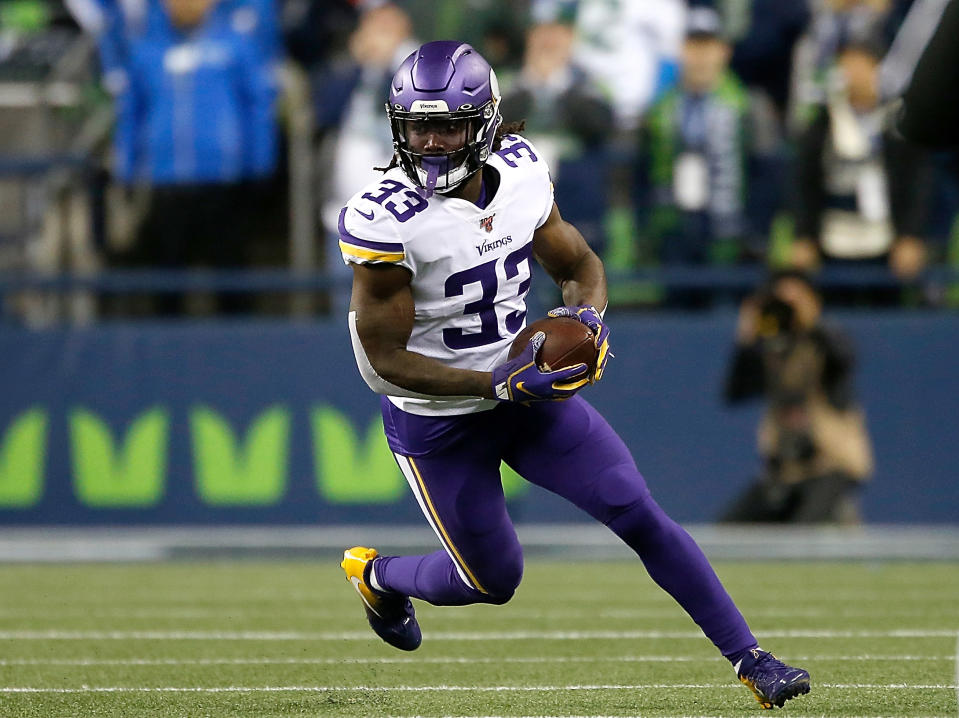 Dalvin Cook immediately walked to the locker room after suffering a shoulder injury vs. the Seahawks. (Otto Greule Jr/Getty Images)