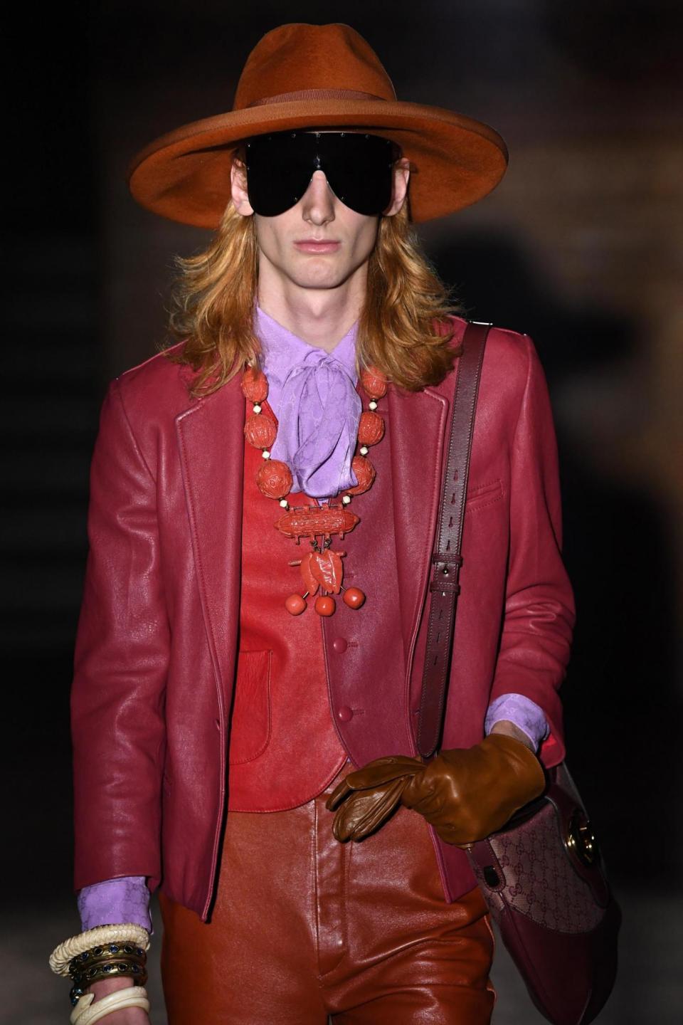 Felt hats and large sunglasses were also championed on the runway (Getty Images for Gucci)