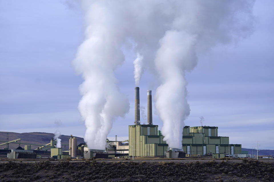 FILE - Steam billows from a coal-fired power plant Nov. 18, 2021, in Craig, Colo. The U.S. Securities and Exchange Commission on Wednesday, March 6, 2024, approved a rule that will require some public companies to report their greenhouse gas emissions and other climate risks. (AP Photo/Rick Bowmer, File)