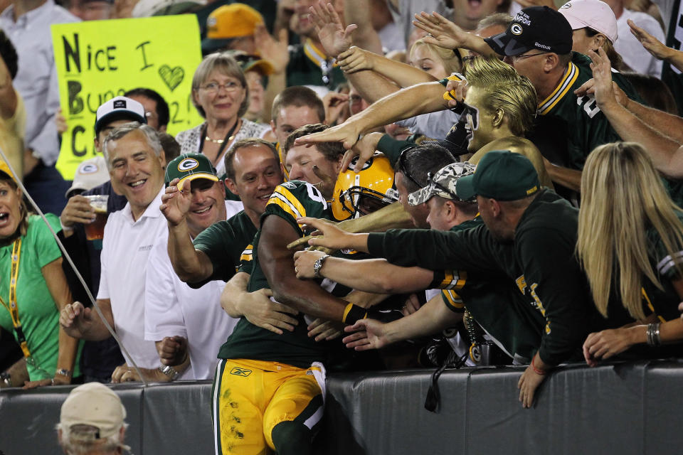 GREEN BAY, WI - SEPTEMBER 08: Randall Cobb #18 of the Green Bay Packers celebrates after scoring a touchdown against the New Orleans Saints during the season opening game at Lambeau Field on September 8, 2011 in Green Bay, Wisconsin. (Photo by Jonathan Daniel/Getty Images)