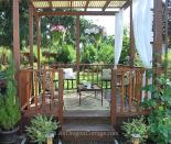 <p>This beautiful wood gazebo was built with love from the remains of an old, rotting deck. Check out this tutorial to see how a backyard eyesore was transformed into a sweet, functional space. </p><p><strong>Get the look at <a href="https://anoregoncottage.com/gazebo-reveal/" rel="nofollow noopener" target="_blank" data-ylk="slk:An Oregon Cottage;elm:context_link;itc:0;sec:content-canvas" class="link ">An Oregon Cottage</a>. </strong></p><p><a class="link " href="https://www.amazon.com/Fab-Habitat-Murano-Recycled-Plastic/dp/B004HGCKGU/?th=1&tag=syn-yahoo-20&ascsubtag=%5Bartid%7C10050.g.30932979%5Bsrc%7Cyahoo-us" rel="nofollow noopener" target="_blank" data-ylk="slk:SHOP OUTDOOR RUGS;elm:context_link;itc:0;sec:content-canvas">SHOP OUTDOOR RUGS</a></p>