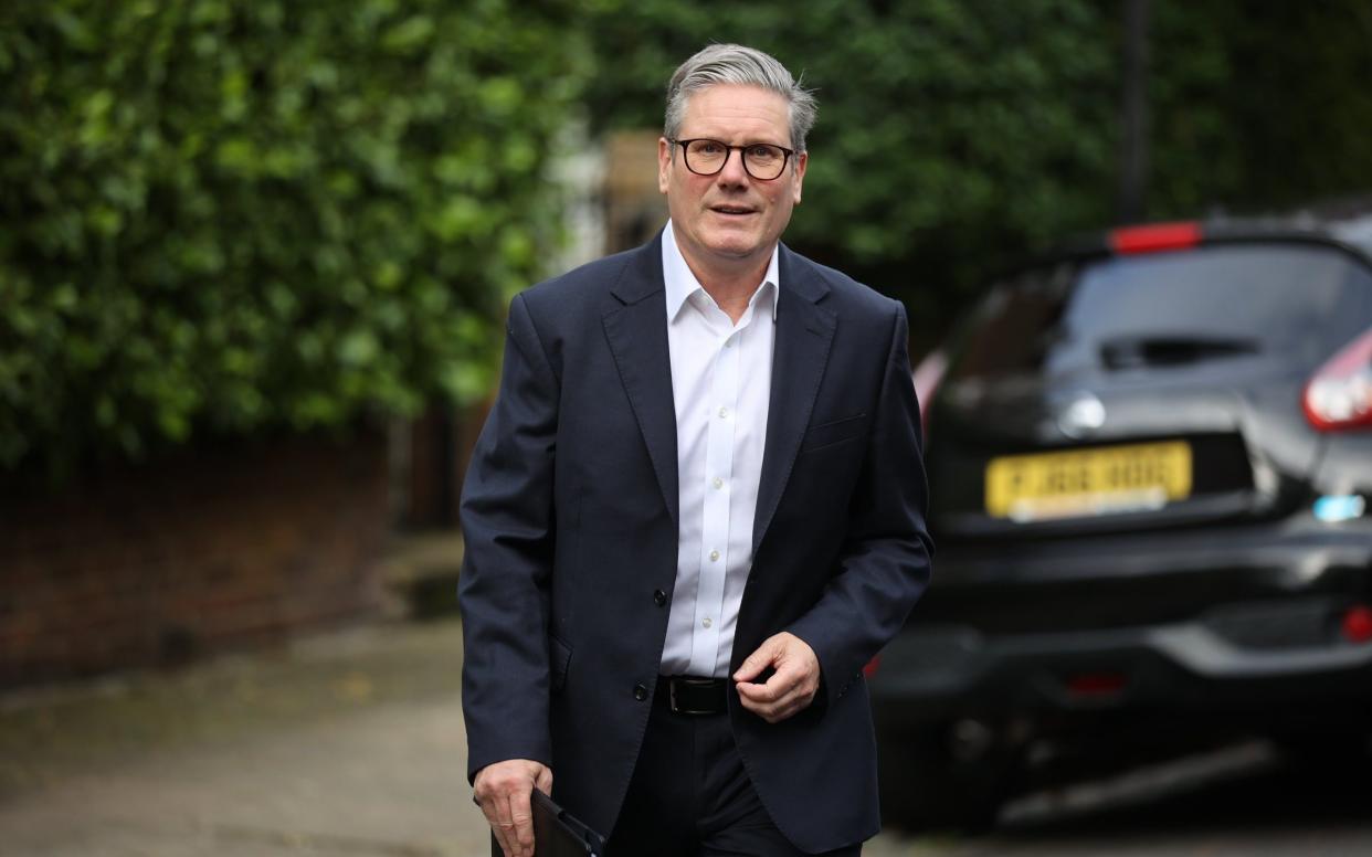 Sir Keir Starmer, the Labour leader, is pictured leaving his London home this morning