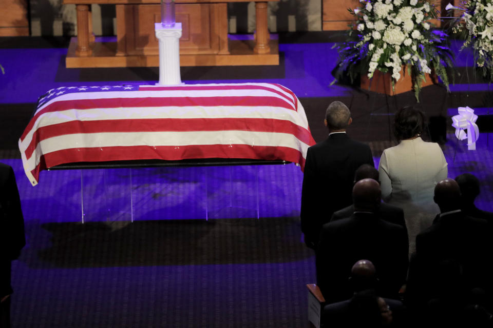 Maya Rockeymoore Cummings, top right, stands next to former President Barack Obama during funeral services for the late Rep. Elijah Cummings, Friday, Oct. 25, 2019, in Baltimore. The Maryland congressman and civil rights champion died Thursday, Oct. 17, at age 68 of complications from long-standing health issues. (AP Photo/Julio Cortez)