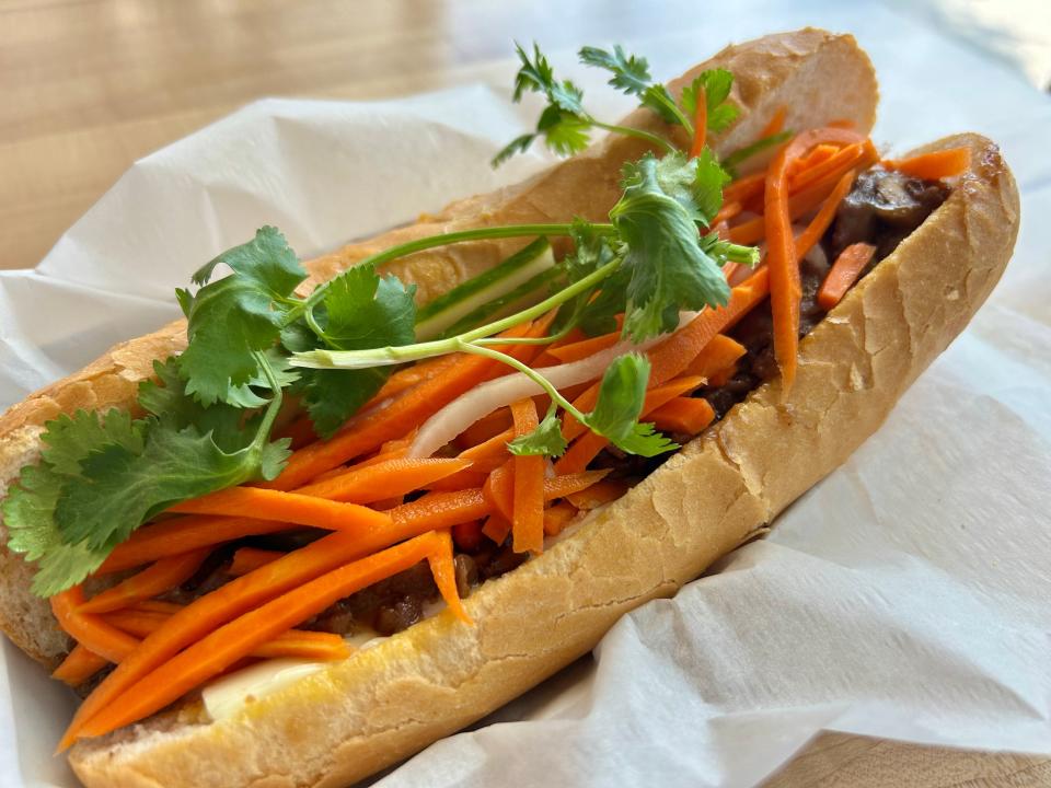 Xankia's steak banh mi features thinly sliced steak, lightly pickled julienned carrot and daikon radish, cucumber ribbons, cilantro and a brush of mayo. Sliced jalapenos are optional.