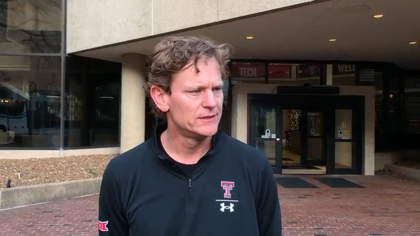 Texas Tech interim head coach Sonny Cumbie speaks with media Saturday, shortly after the Red Raiders arrived in Memphis, Tennessee, to begin on-site preparations for the Liberty Bowl on Tuesday against Mississippi State.