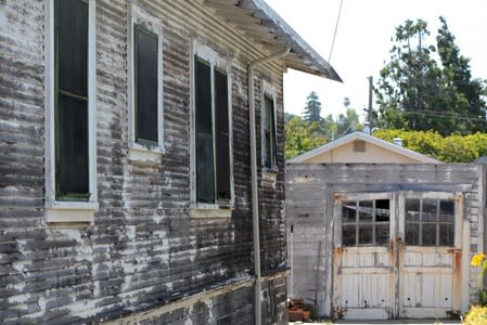 A home in need of lead abatement is pictured in Oakland