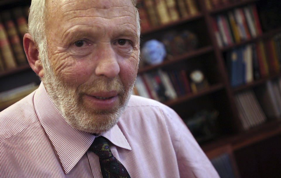 FILE - Jim Simons, a businessman and founder of Math for America, poses at his New York office, Wednesday, Dec. 14, 2005. Simons, a renowned mathematician and pioneering investor who built a fortune on Wall Street and then became one of the nation's biggest philanthropists, died Friday, May 10, 2024. He was 86. (AP Photo/Jason DeCrow, File)