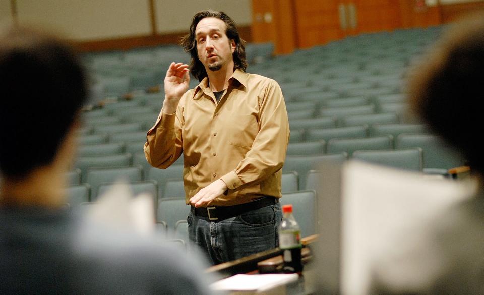Joseph Ohrt leads choir practice at Central Bucks West High School in 2006.