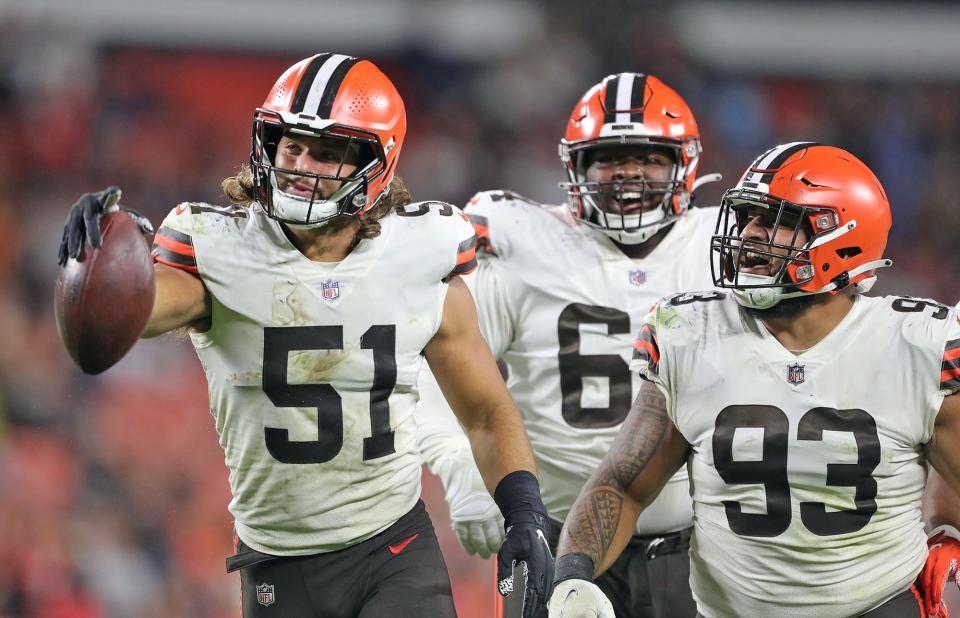 Browns linebacker Jordan Kunaszyk (51) celebrates with teammates after recovering a Bears fumble during the second half of a preseason game, Saturday, Aug. 27, 2022, in Cleveland.