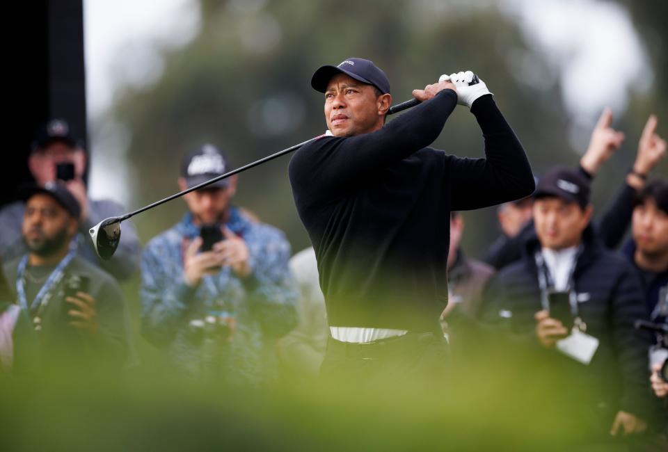 Tiger Woods tees off on the first hole during the Genesis Invitational pro-am golf event at Riviera Country Club, Wednesday, Feb. 14, 2024, in the Pacific Palisades area of Los Angeles. (AP Photo/Ryan Kang)