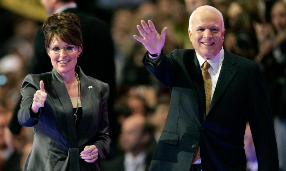 Senator John McCain and Alaska Governor Sarah Palin gesture onstage at the 2008 Republican National Convention in St Paul, Minnesota.
