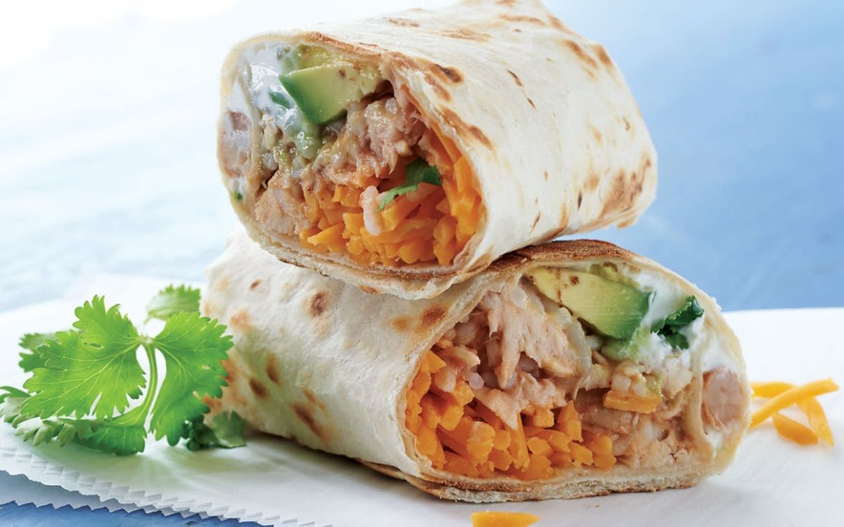 <a href="/903065/parade/add-slow-cooker-chicken-burritos-to-your-back-to-school-dinner-rotation/" data-ylk="slk:Slow-Cooker Chicken Burritos;elm:context_link;itc:0;sec:content-canvas" class="link rapid-noclick-resp">Slow-Cooker Chicken Burritos</a>.