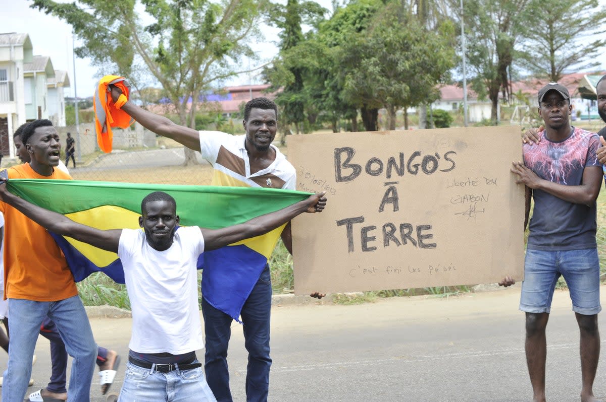 Residents in Gabon celebrate the apparent coup (AFP via Getty Images)