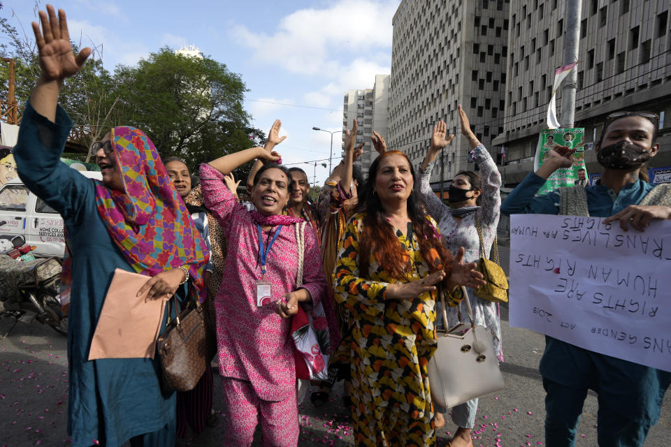 Members of Pakistan's transgender community gesture, during a protest in Karachi, Pakistan, Saturday, May 20, 2023. Transgender activists in Pakistan say they plan to appeal an Islamic court’s ruling that guts a law aimed at protecting their rights. The Transgender Persons (Protection of Rights) Act was passed by Parliament in 2018 to secure the fundamental rights of transgender Pakistanis. But the Federal Shariat Court struck down several provisions of the law on Friday, terming them “un-Islamic.” (AP Photo/Fareed Khan)