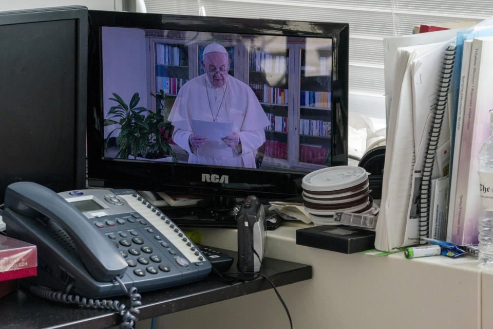 Pope Francis is seen on a video screen at United Nations headquarters as he speaks in a pre-recorded message addressing the 75th session of the United Nations General Assembly the 75th session of the United Nations General Assembly, Friday, Sept. 25, 2020, at U.N. headquarters. (AP Photo/Mary Altaffer)