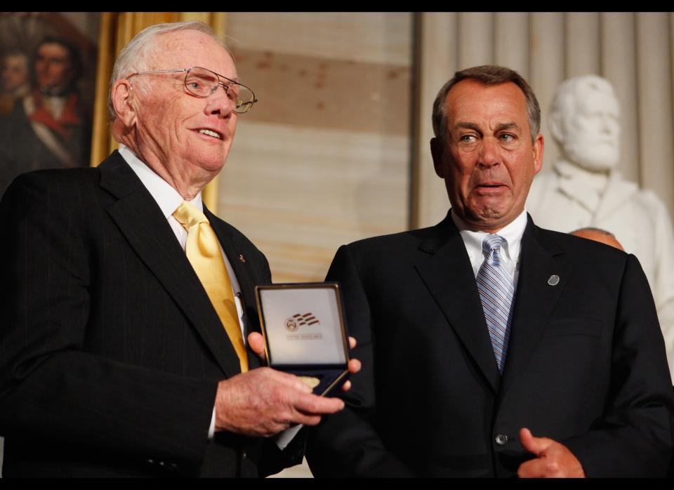 Astronaut Neil Armstrong (L) recievces the Congressional Gold Medal from Speaker of the House John Boehner (R-Ohio) during a ceremony in the Rotunda of the U.S. Capitol November 16, 2011 in Washington, DC. The gold medals were presented to Armstrong and his fellow crew members from Apollo 11, Michael Collins and Buzz Aldrin, and to astronaut and former U.S. Senator John Glenn (D-Ohio), the first American to orbit the Earth. 