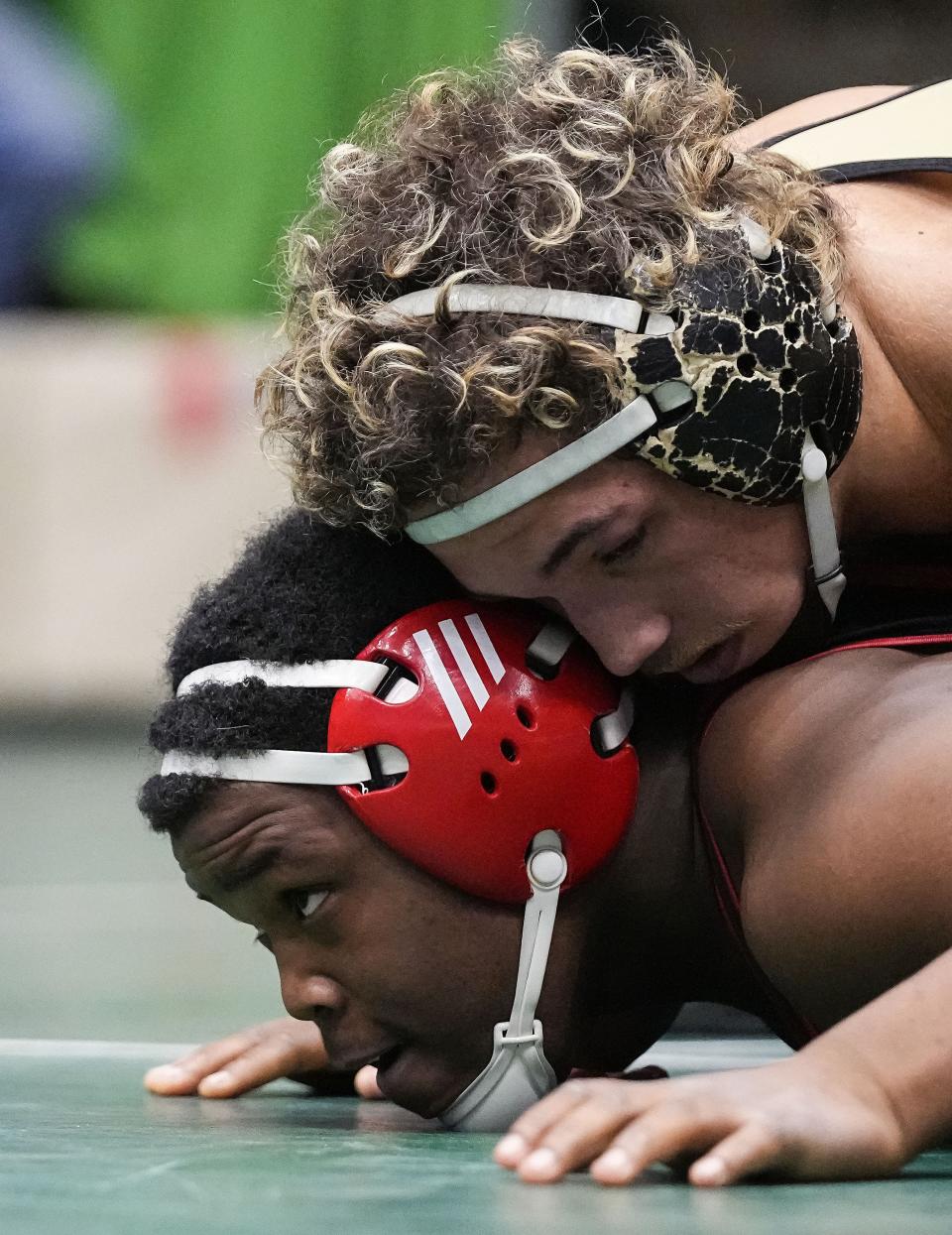 Lawrence North Brandon Johnson wrestles Mt. Vernon Devin Kendrex during the IHSAA wrestling semi-state on Saturday, Feb. 11, 2023 at New Castle Fieldhouse in New Castle.