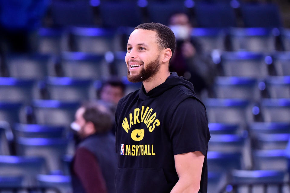 Stephen Curry #30 of the Golden State Warriors reacts during warms up before the game against the Memphis Grizzlies at FedExForum on January 11, 2022 in Memphis, Tennessee. (Justin Ford/Getty Images)