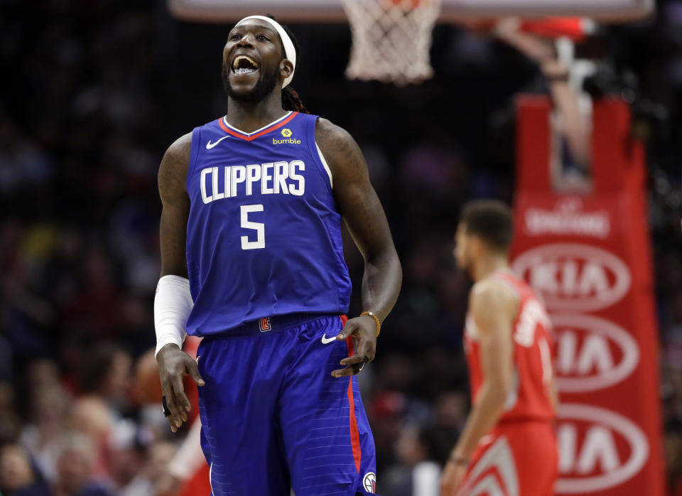 Los Angeles Clippers' Montrezl Harrell (5) celebrates after scoring against the Houston Rockets during the second half of an NBA basketball game Sunday, Oct. 21, 2018, in Los Angeles. The Clippers won, 115-112. (AP Photo/Marcio Jose Sanchez)