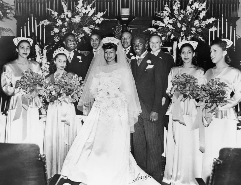 Jackie Robinson is pictured with new wife Rachel Isum and their bridal party.