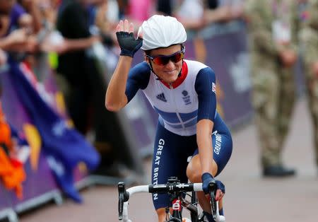 Britain's Elizabeth Armitstead waves before the women's cycling road race final at the London 2012 Olympic Games July 29, 2012. REUTERS/Cathal McNaughton