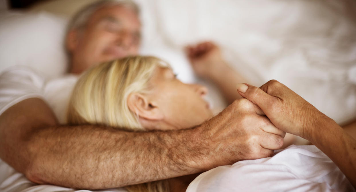 Couple in bed, to represent sex as widows/widower. (Getty Images)