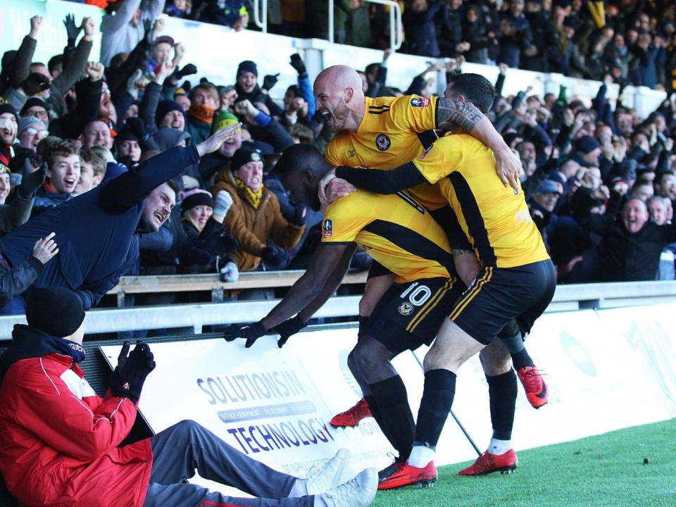 David Pipe and Padraig Amond join Frank Nouble as he celebrates his side's equaliser (Getty)