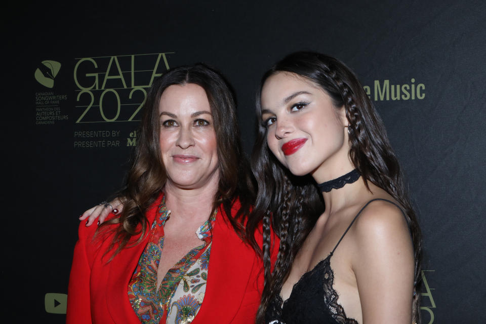 Alanis Morissette and Olivia Rodrigo pose together on the red carpet.