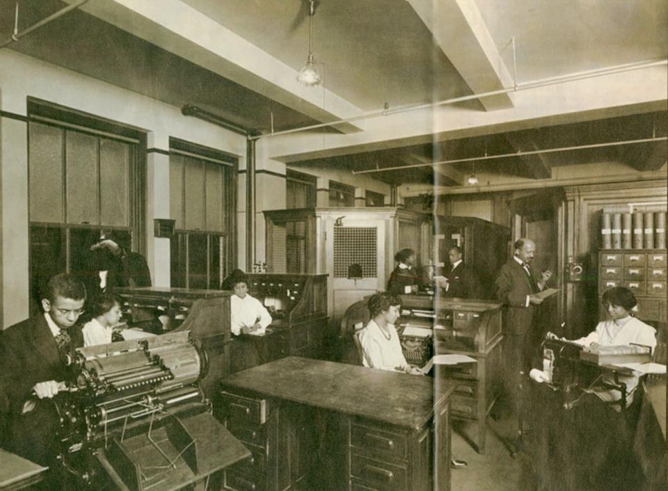 W.E.B. Du Bois (back right) in the Crisis newsroom.