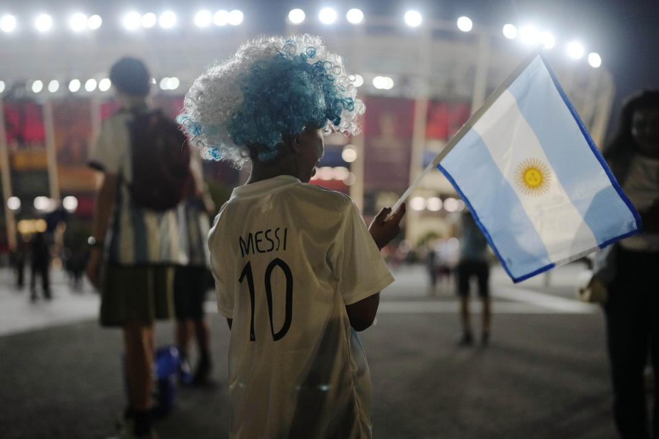 FILE - An Argentina soccer fan from India waits outside before the World Cup group C soccer match between Poland and Argentina at the Stadium 974 in Doha, Qatar, Wednesday, Nov. 30, 2022. (AP Photo/Natacha Pisarenko, File)