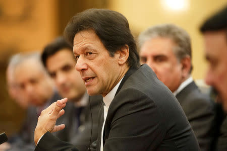 FILE PHOTO: Pakistani Prime Minister Imran Khan attends talks with Chinese President Xi Jinping (not pictured) at the Great Hall of the People in Beijing, November 2, 2018. REUTERS/Thomas Peter/File Photo