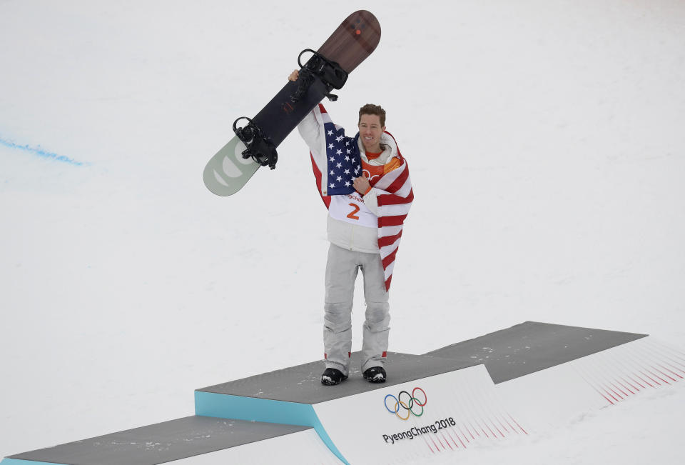 FILE - Shaun White, of the United States, celebrates his gold medal after the men's halfpipe finals at Phoenix Snow Park at the 2018 Winter Olympics in Pyeongchang, South Korea, Feb. 14, 2018. The Beijing Olympics will be the fifth Olympics for the three-time gold medalist. And the last Olympics for the 35-year-old — get this — elder-statesman who is now more than double the age of some of the riders he goes against. (AP Photo/Kin Cheung, File)