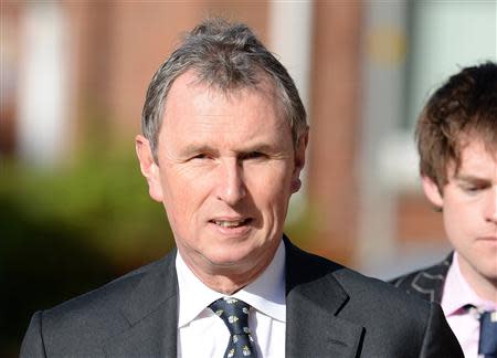 British Conservative MP and former Deputy Speaker of the House of Commons Nigel Evans arrives at Preston Crown Court northern England April 10, 2014. REUTERS/Nigel Roddis
