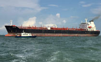 <p>Tanker Alnic MC is seen in Singapore waters after a collision with U.S. Navy USS John S. McCain, Aug. 21, 2017. (Photo: Christoph Van Der Perre/Reuters) </p>