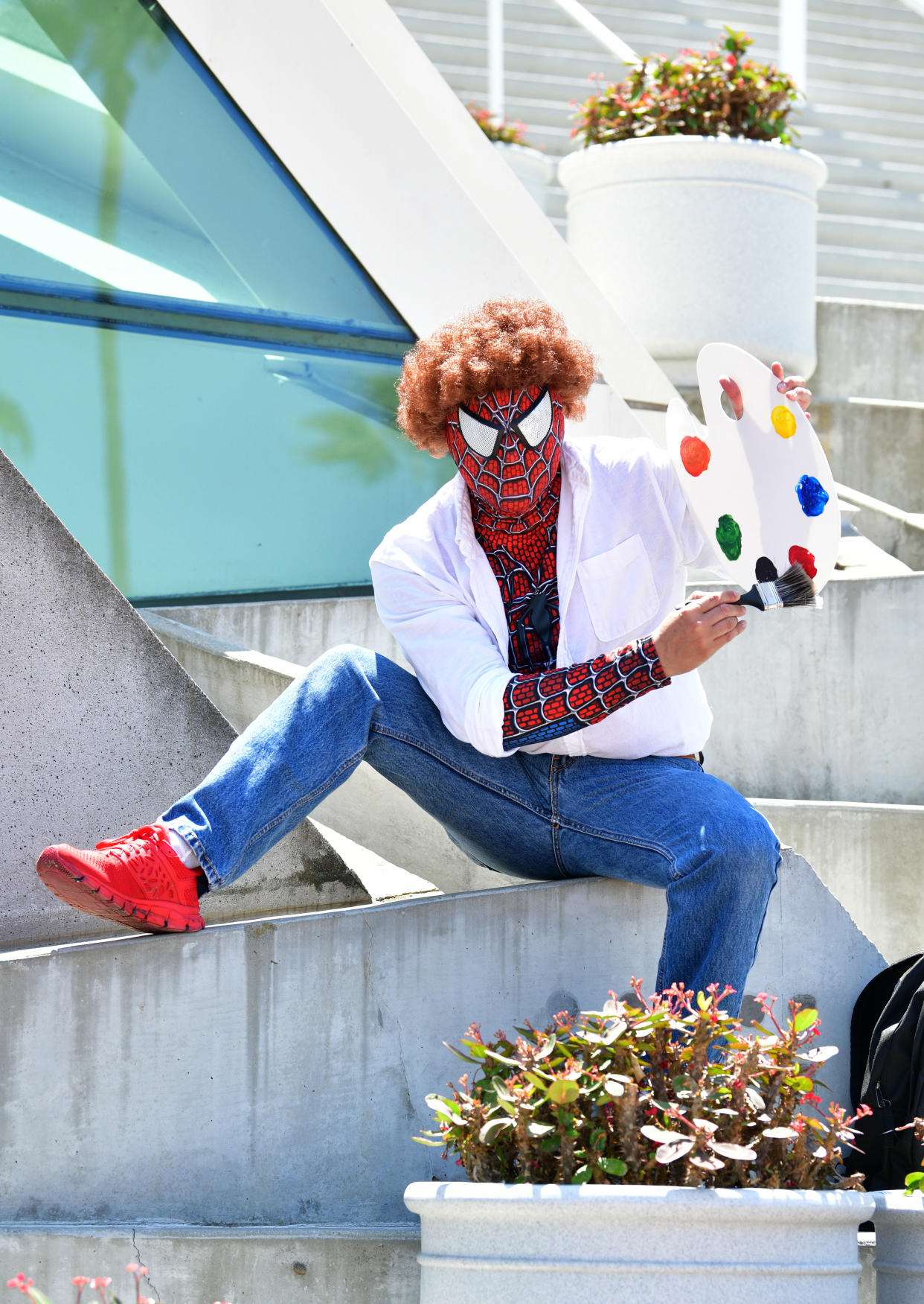 A cosplayer dressed as Spider-Man Bob Ross.