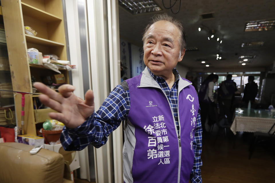 Chui Pak-tai, a Taiwanese of Hong Kong descent, speaks during an interview with The Associated Press at his campaign headquarter in New Taipei City, Taiwan, on Dec. 4, 2023. At 72, Chui, a former Hong Kong pro-democracy district councilor who secured Taiwan residency 11 years ago, is running for legislative office. Although he faces long odds, his campaign draws attention to the immigration challenges of the Hong Kong diaspora.(AP Photo/Chiang Ying-ying)