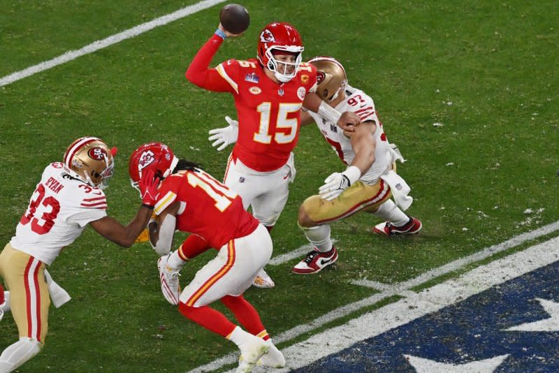 Kansas City Chiefs quarterback Patrick Mahomes passes while under pressure from the San Francisco 49ers in the third quarter of Super Bowl LVIII on Sunday at Allegiant Stadium in Las Vegas. Photo by Jon SooHoo/UPI