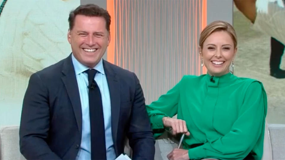 Karl Stefanovic in suit and Ally Langford in green shirt smile on Today 2020