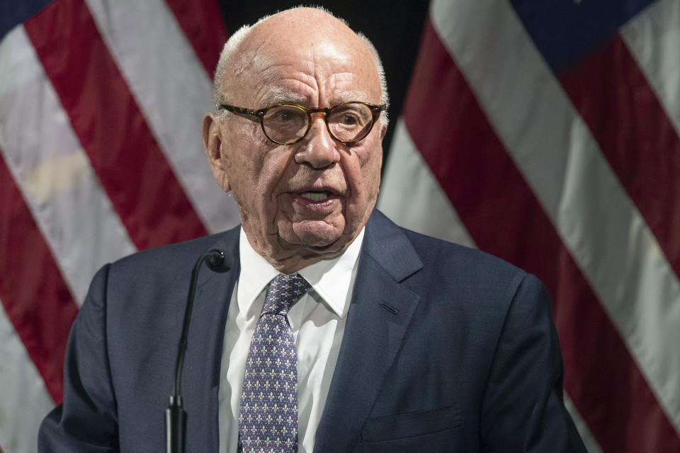 FILE - Rupert Murdoch introduces Secretary of State Mike Pompeo during the Herman Kahn Award Gala on Oct. 30, 2019, in New York. The Delaware judge overseeing Dominion Voting Systems' $1.6 billion defamation lawsuit against Fox News announced late Sunday, April 16, that he was delaying the start of the trial until Tuesday, April 18. The trial had been scheduled to start Monday morning with jury selection and opening statements. Fox News stars Tucker Carlson and Sean Hannity and founder Murdoch are among the people expected to testify over the next few weeks. (AP Photo/Mary Altaffer, File)