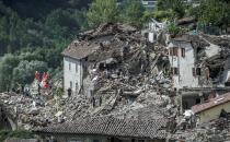 <p>Rescuers work following an earthquake in Pescara del Tronto, central Italy, Aug. 24, 2016. (REUTERS/Adamo Di Loreto) </p>