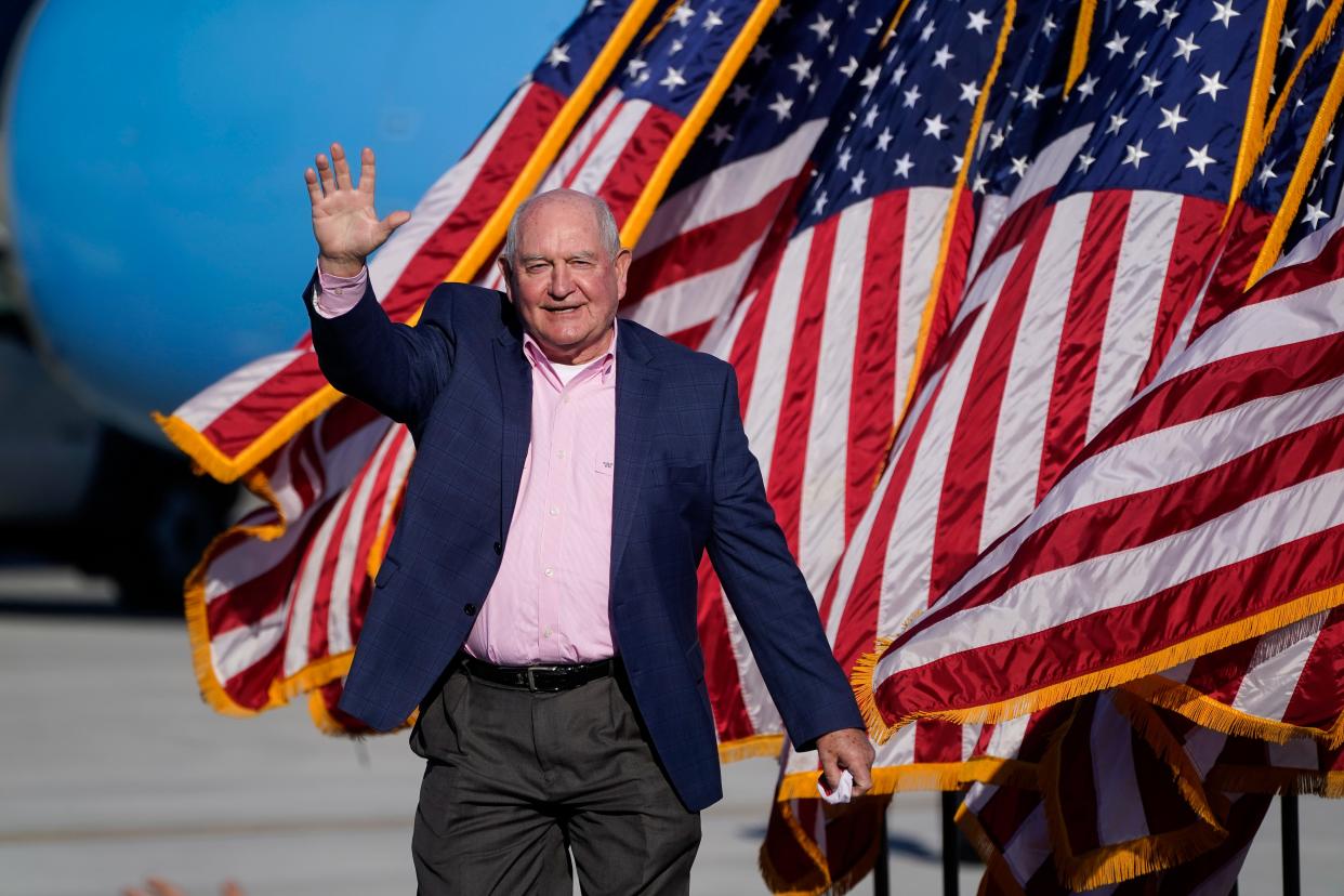 FILE - In this Dec. 10, 2020 file photo, then Agriculture Secretary Sonny Perdue arrives at a campaign rally in Augusta, Ga. The chancellor for the University System of Georgia said some state universities to face funding cuts in wake of enrollment declines.