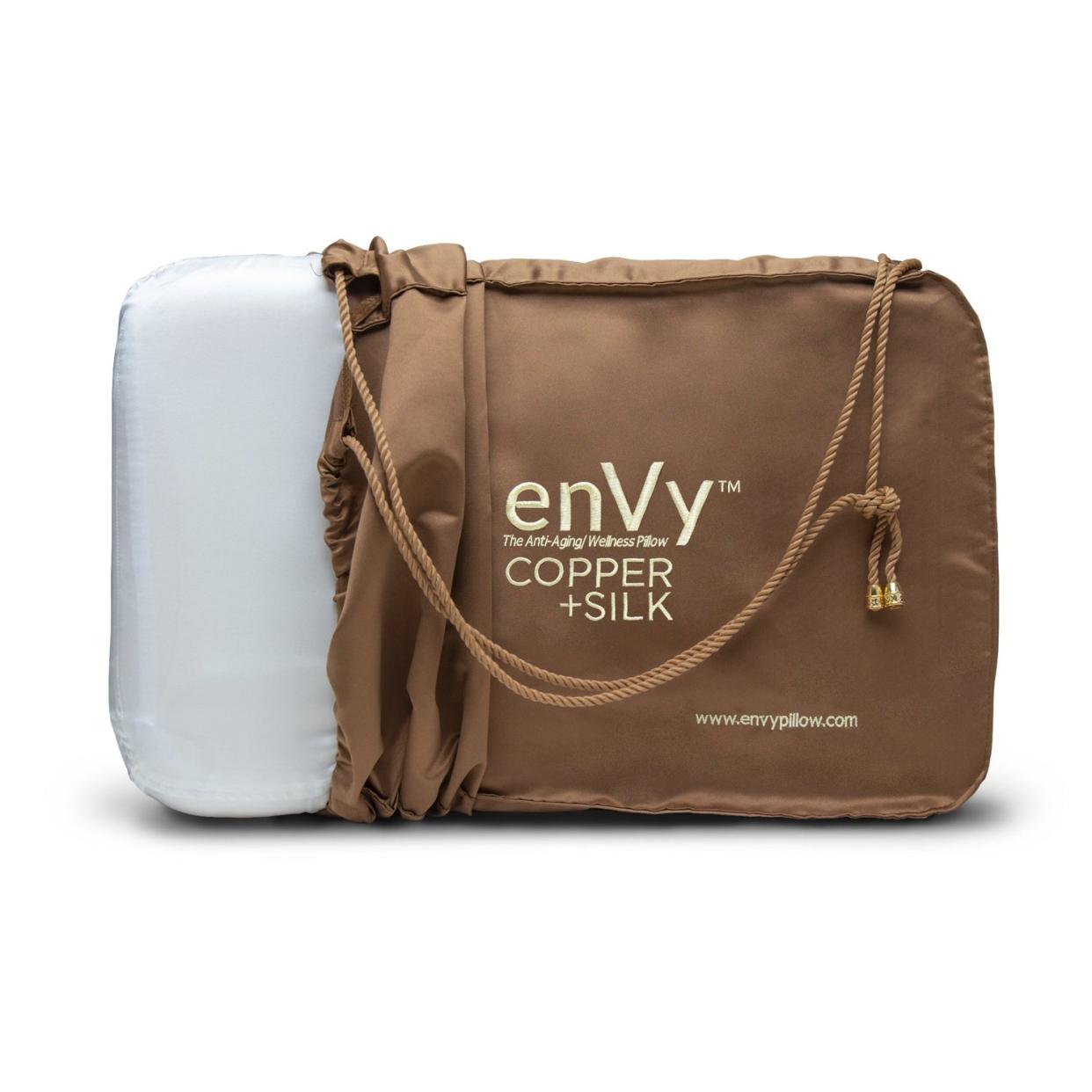 <p><a href="https://www.envypillow.com/collections/anti-aging/products/envy-silk-covered-copper-powered-natural-latex-anti-aging-pillow" rel="nofollow noopener" target="_blank" data-ylk="slk:Shop Now;elm:context_link;itc:0;sec:content-canvas" class="link rapid-noclick-resp">Shop Now</a></p><p>The enVy® Copper + Silk 100% Natural Latex PROACTIVE-Aging Pillow</p><p>envypillow.com</p><p>$259.00</p>