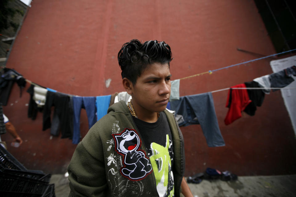 In this May 12, 2012 photo, Manuel de Jesus Chavez, 16, a migrant from El Salvador, waits for a north bound train to continue his journey to the US-Mexico border, at a shelter in Lecheria, on the outskirts of Mexico City. While the number of Mexicans heading to the U.S. has dropped dramatically, a surge of Central American migrants is making the 1,000-mile northbound journey this year, fueled in large part by the rising violence brought by the spread of Mexican drug cartels. (AP Photo/Marco Ugarte)