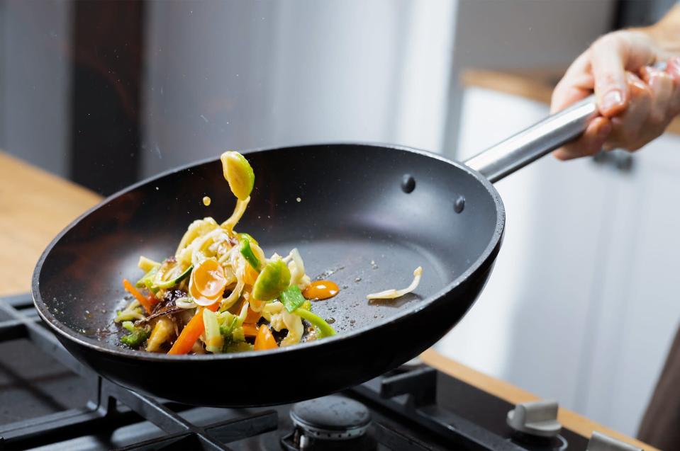 skillet sauteing vegetables