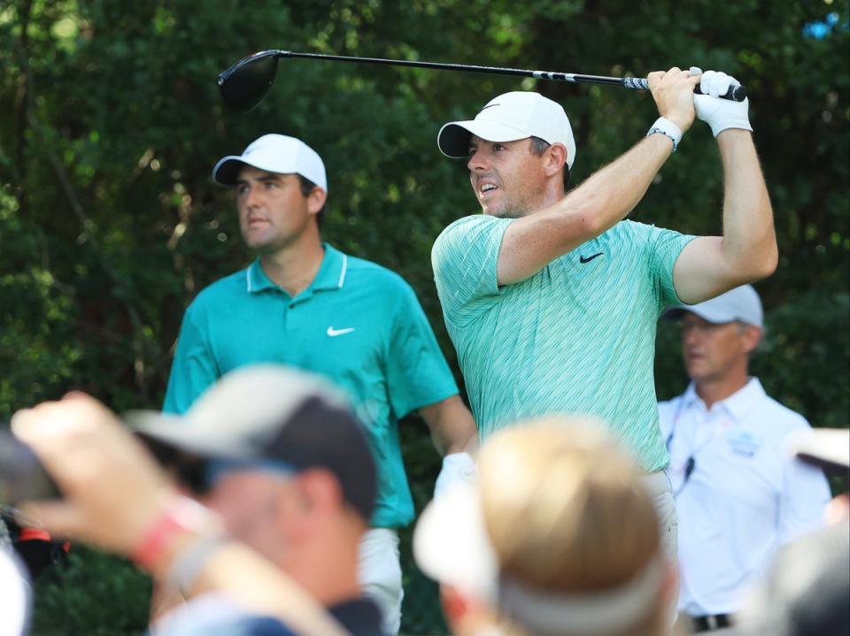 Rory McIlroy (right) will hope to complete a career grand slam as Scottie Scheffler (left) defends his Masters crown  (Getty Images)