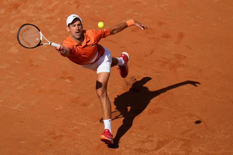 Novak Djokovic returns the ball to Stefanos Tsitsipas during their Italian Open final in Rome (Alessandra Tarantino/AP) (AP)