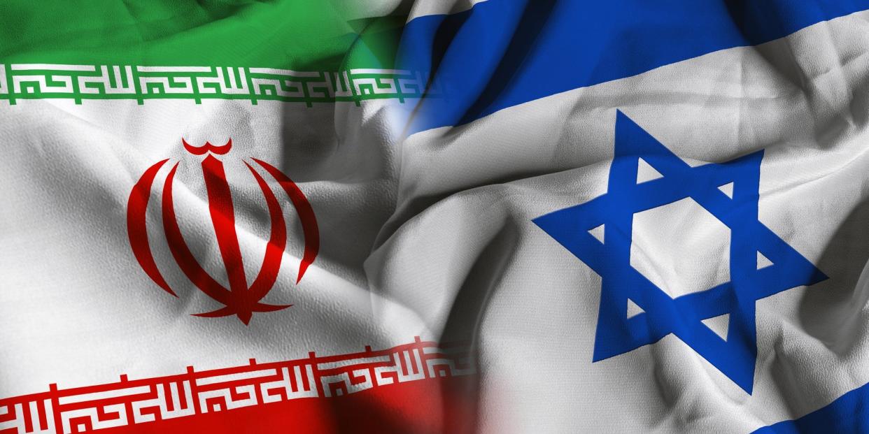 The flags of Iran, left, and Israel, right.