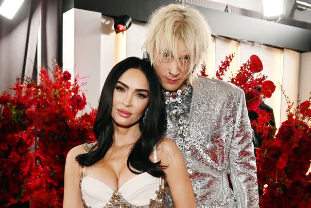 <p>Lester Cohen/Getty</p> Megan Fox and Machine Gun Kelly attend the 65th GRAMMY Awards in 2023